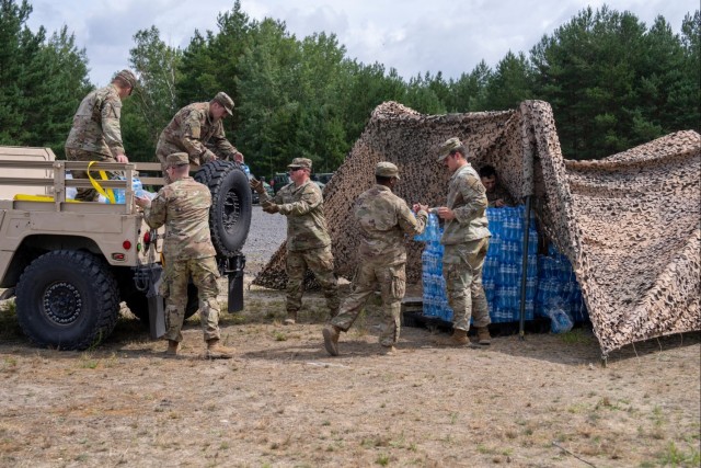 1st Armored Division sustainment Soldiers coordinate logistics for convoy protection