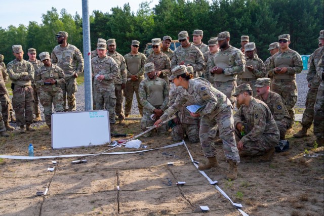 1st Armored Division sustainment Soldiers coordinate logistics for convoy protection
