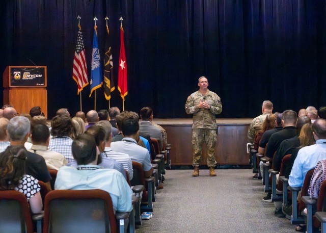 PICATINNY ARSENAL, N.J. - Brig. Gen. Robert, Commanding General, U.S. Army Combat Capabilities Development Command, or DEVCOM, speaks to the Armaments Center workforce during a town hall meeting at Picatinny Arsenal.