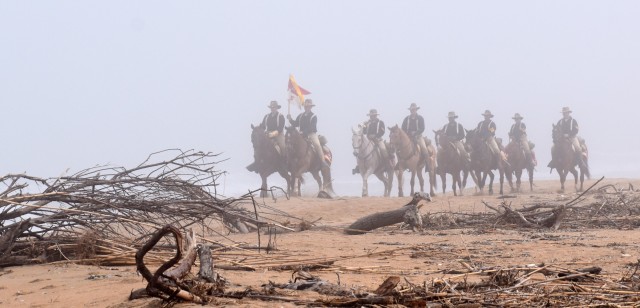 Members of the 11th Armored Cavalry Regiment Horse Detachment ride at Salinas River State Beach, Moss Landing, Calif., May 13