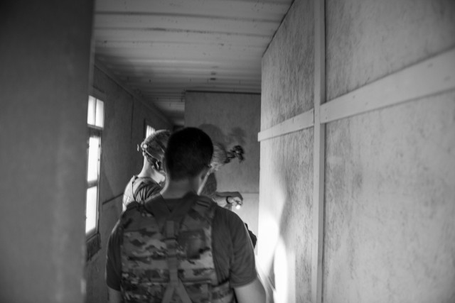 Spc. Robert Bowley, an electromagnetic warfare specialist with the 37th Infantry Brigade Combat Team, navigates the Combined Arms Collective Training Facility to find the best position for monitoring the electromagnetic spectrum with the Beast+...