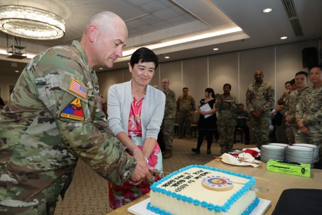 403rd AFSB commander Col. Henry Brown relinquishes command to Col. Jason Book in change of command ceremony