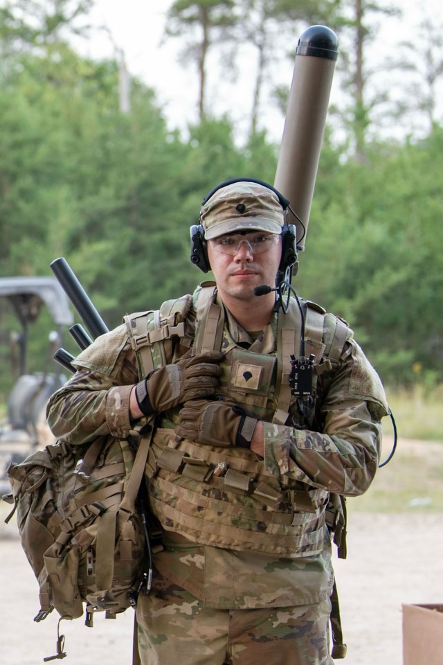 Spc. Robert Bowley, an electromagnetic warfare specialist with the 37th Infantry Brigade Combat Team, prepares to monitor the electromagnetic spectrum with the Beast+ system during Northern Strike at the Combined Arms Collective Training Facility,...
