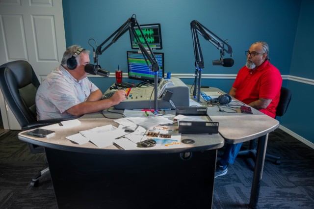 Walter Harris, Fort Leonard Wood transition services manager (right), tells KFLW 98.9 The Mix Host Jamie Turner (left), about Fort Leonard Wood’s upcoming career summit scheduled from 8:30 a.m. to 4:30 p.m., Aug. 21 at Nutter Field House. At the...