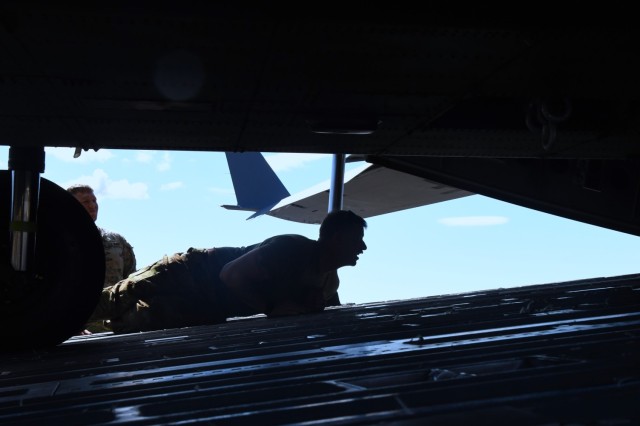 U.S. Army National Guard Soldiers from 1st Battalion 168th General Support Aviation Regiment assist in UH-60 Black Hawk helicopter load up in support of Enduring Partners at Joint Base Lewis-McChord, Wash., August 13, 2025. Enduring Partners 2025...