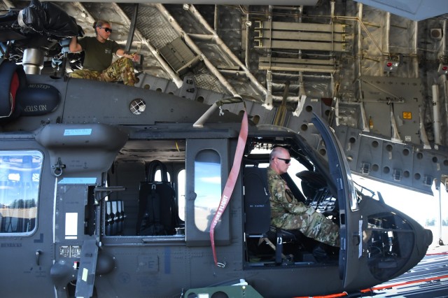 U.S. Army National Guard Soldiers from 1st Battalion 168th General Support Aviation Regiment assist in UH-60 Black Hawk helicopter load up in support of Enduring Partners at Joint Base Lewis-McChord, Wash., August 13, 2025. Enduring Partners 2025...