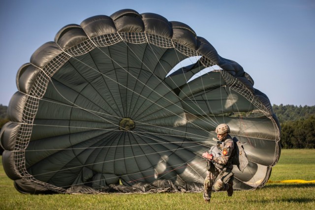 U.S. Army and International Paratroopers conduct a static line Airborne jump using their MC-6 parachutes out of a Ch-47 Chinook Helicopter during Leapfest at Glen Rock Drop Zone, Exeter, Rhode Island, August 2, 2025. All competing Paratroopers use...
