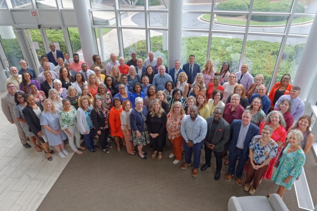 DoDEA Senior Leaders Pose Together at Summer Leadership Gathering