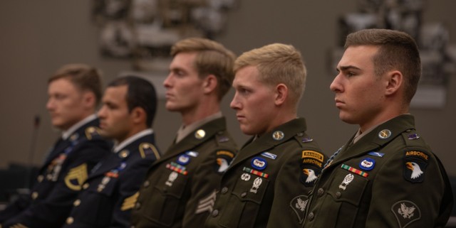 Competitors representing XVIII Airborne Corps, Fort Bragg, North Carolina, receive guidance from a sergeant major during the 2025 FORSCOM Best Squad Competition, on Fort Bliss, Texas, Aug. 15, 2025. Squads from across U.S. Army Forces Command...