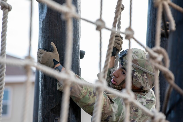 Spc. Christian Luevano, a competitor representing the National Training Center, Fort Irwin, California navigates a Ninja Warrior Course obstacle during the 2025 FORSCOM Best Squad Competition, on Fort Bliss, Texas, Aug. 12, 2025. Squads from...