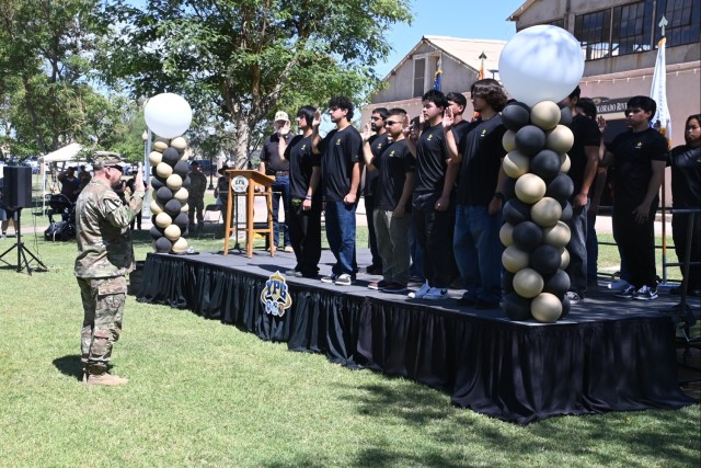 U.S. Army Yuma Proving Ground Commander Col. John Nelson (left) swears in new Army recruits at the 250th Army Birthday celebration at Colorado River State Historic Park on June 14, 2025.