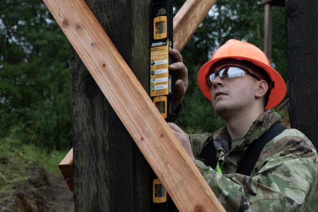 Alaska Army National Guard Spc. David Krepel, assigned to the 910 Engineer Support Company, conducts measurements for a bunker at Observation Post Fagan on Joint Base Elmendorf-Richardson Aug. 7, 2025, enhancing the training site for the U.S....