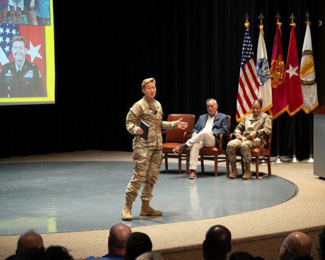 Brig. Gen. Beth A. Behn, commanding general of U.S. Army Tank-automotive and Armaments Command, addresses the workforce during an Aug. 18, 2025, town hall at the Detroit Arsenal.