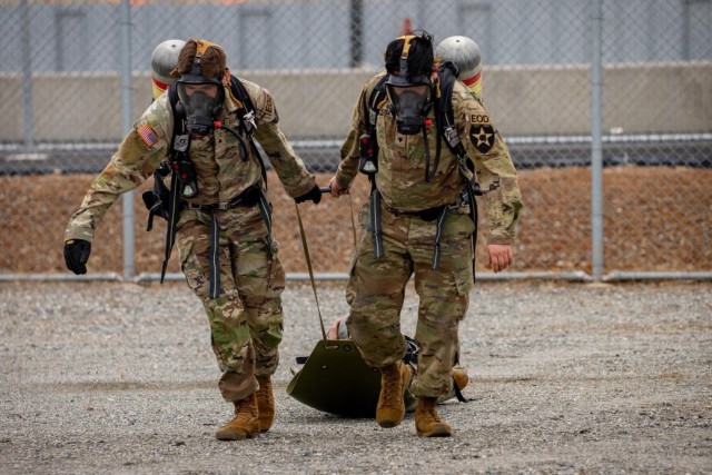 Army Explosive Ordnance Disposal techs help people out of flooded vehicle in New Jersey