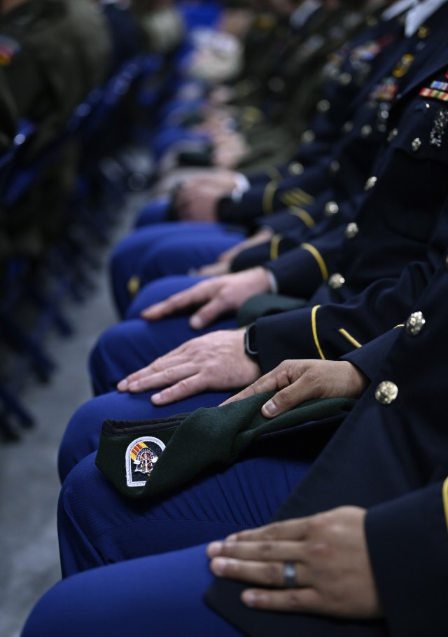 Students from the U.S. Army John F. Kennedy Special Warfare Center and School take part in a Regimental First Formation as they graduate from the Special Forces Qualification Course at the Crown Coliseum in Fayetteville, North Carolina, Aug. 28,...