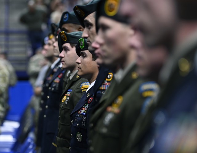 Students from the U.S. Army John F. Kennedy Special Warfare Center and School take part in a Regimental First Formation as they graduate from the Special Forces Qualification Course at the Crown Coliseum in Fayetteville, North Carolina, Aug. 28,...