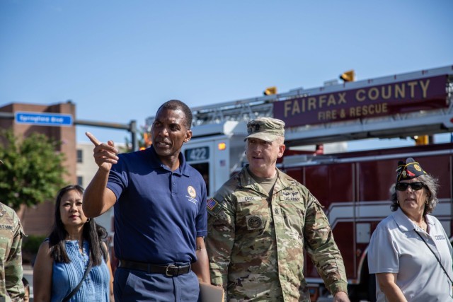Franconia District Supervisor Rodney Lusk (left) and Fort Belvoir Garrison Command Sergeant Major, Command Sgt. Maj. Brandon Creel complete the symbolic walk across Veterans Bridge during the 2025 Franconia-Springfield Bridge Walk, Saturday,...