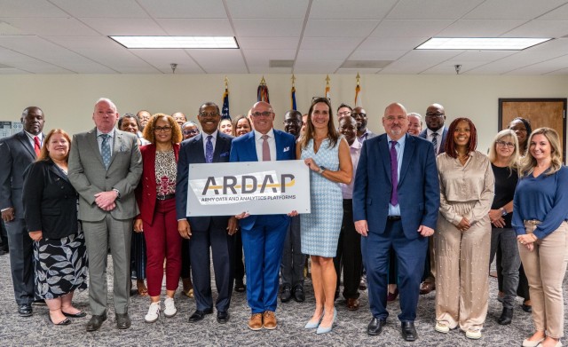 Present and past PEO Enterprise team members celebrate ARDAP&#39;s accomplishments.