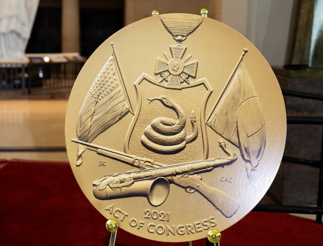 A large reproduction of the Congressional Gold Medal on display before a ceremony honoring the Army’s World War I 369th Infantry Regiment, the “Harlem Hellfighters,” in Emancipation Hall at the U.S. Capitol, September 3, 2025, in Washington.