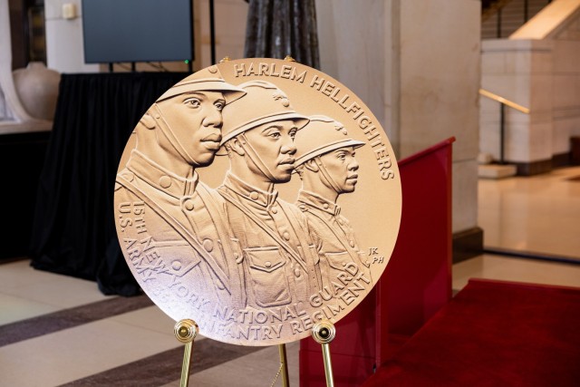 A large reproduction of the Congressional Gold Medal on display before a ceremony honoring the Army’s World War I 369th Infantry Regiment, the “Harlem Hellfighters,” in Emancipation Hall at the U.S. Capitol, September 3, 2025, in Washington.