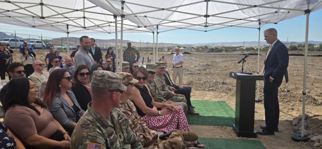Adam Hay, Regional Vice President, Michaels Management, offered context on how this project began as a humble suggestion about six years ago, while addressing attendees of the Fort Irwin Apartments ground-breaking ceremony on Fort Irwin,...