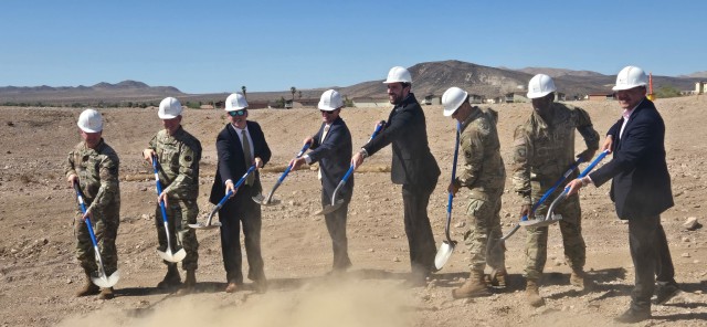 U.S. Army Garrison - Fort Irwin, the National Training Center, and Army Housing Office leadership hold shovels with leaders of Michael&#39;s Organization during the Fort Irwin Apartments ground-breaking ceremony on Fort Irwin, California, Sept. 3,...