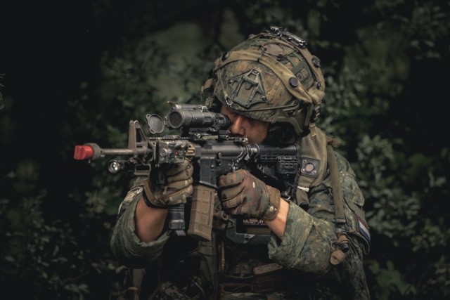 A Dutch soldier assigned to the 17th Light Armored Battalion pulls security during Exercise Saber Junction 25 at the Hohenfels Training Area, Joint Multinational Readiness Center, Germany, Sept. 5, 2025.