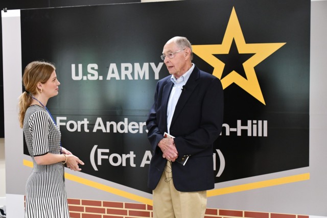 Mr. John Sherwood speaks with the press