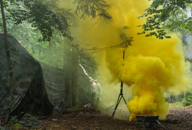 The headquarters element of 1st Cavalry Squadron, 2nd Cavalry Regiment, reacts to a simulated chemical attack at the Joint Multinational Training Center (JMRC) Hohenfels, Germany Sept. 10, 2025. The unit was being targeted by indirect fire and...