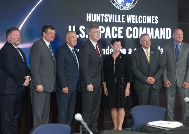 From left are Martin Traylor, Garrison deputy commander; Chip Cherry, president and CEO of Huntsville/Madison County Chamber; Mac McCutcheon, Madison County Commission chairman; Huntsville Mayor Tommy Battle; Lucia Cape, Huntsville/Madison County...