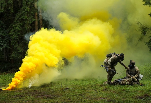 The headquarters element of 1st Cavalry Squadron, 2nd Cavalry Regiment, reacts to a simulated chemical attack at the Joint Multinational Training Center (JMRC) Hohenfels, Germany Sept. 10, 2025. The unit was being targeted by indirect fire and...