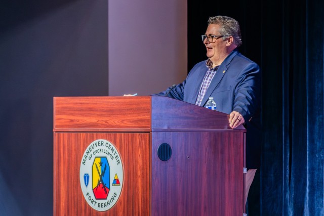 Ian Sullivan, U.S. Army Training and Doctrine Command, G-2 security officer, delivers a presentation on operational environment during the second day of the annual Maneuver Warfighter Conference