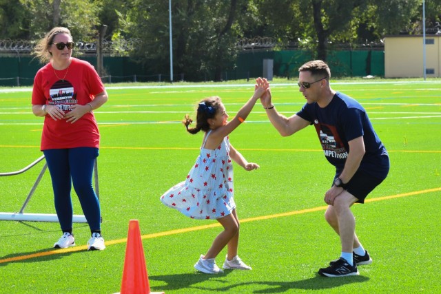 In commemoration of the 9/11/2001 attacks, the USAG-Italy Fire Department hosted a public Firefighter Challenge. This event includes a series of physical challenges, including a charged hose pull, a dummy drag, a Keiser sled, and a tire flip. The...