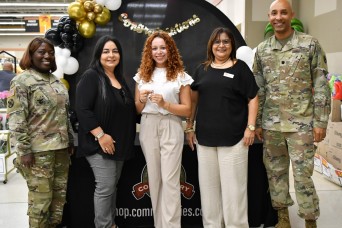 Fort Buchanan Commissary Awards Fisher House Scholarship for Military Children