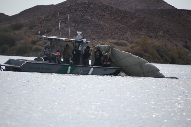 State and federal law enforcement agencies lend support for Airborne Soldiers’ air to water jump