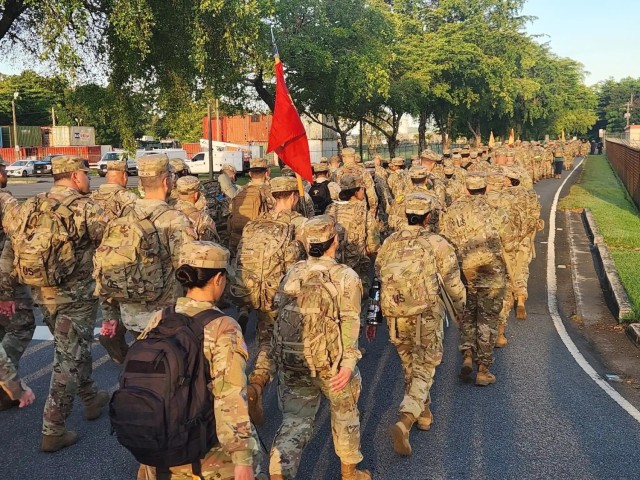 Fort Buchanan Remembers the 9/11 attacks with a road march and donating food to the island's disadvantaged