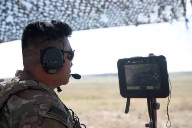 Spc. Anthony Tran, assigned to Charlie Battery, 2nd Battalion, 77th Field Artillery Regiment, Division Artillery, 4th Infantry Division, inspects the new fire control system for the M777 howitzer during Ivy Sting 1 on Fort Carson, Colo., Sept. 16,...