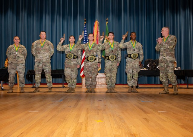 U.S. Army Military Police School Regimental Chief Warrant Officer 4 Angela Rulewich (left), Col. Charles Green (second from left), Military Police Corps chief, and U.S. Army Military Police School Regimental Command Sgt. Maj. James Rutherford...