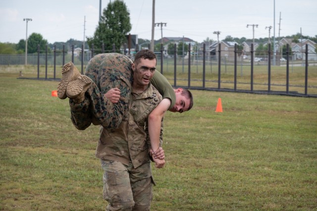 Military Police Warfighter competitor, Staff Sgt. Jacob Sammis, participates in a Marine Corps Combat Fitness Test Sept. 20 at Training Area 122.