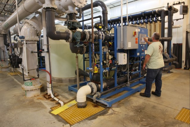Radford Army Ammunition Plant employee checking configurations in one of the plant's two drinking water facilities.