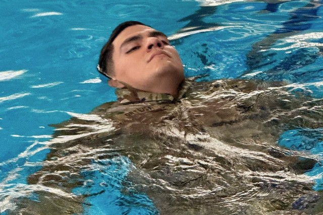 Sgt. 1st Class John Ortega, a talent manager assigned to U.S. Army Human Resources Command completes an Army combat water survival training drill as part of the HRC Noncommissioned Officer of the Year competition. The competition consisted of...