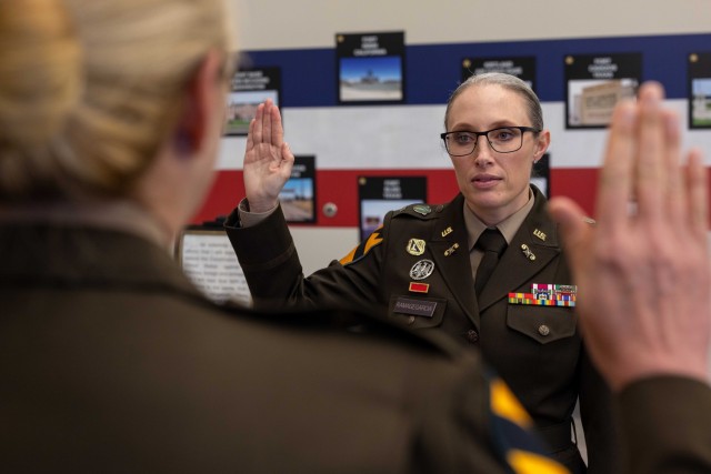Chief Warrant Officer 4 Victoria RamageGarcia, the senior warrant officer advisor for the 20th Chemical, Biological, Radiological, Nuclear, Explosives (CBRNE) Command, is promoted to her current rank during a ceremony on Aberdeen Proving Ground,...