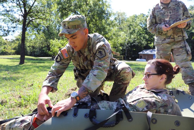 Sgt. 1st Class John Ortega, a talent manager assigned to U.S. Army Human Resources Command completes a combat lifesaver skills drill as part of the HRC Noncommissioned Officer of the Year competition. The competition consisted of various warrior...