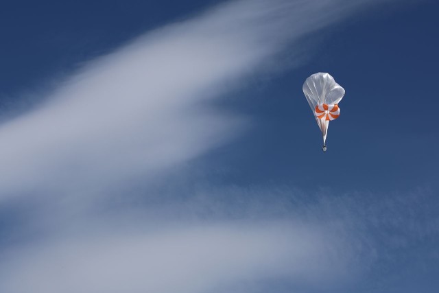 A High-Altitude Balloon (HAB) rises through the troposphere