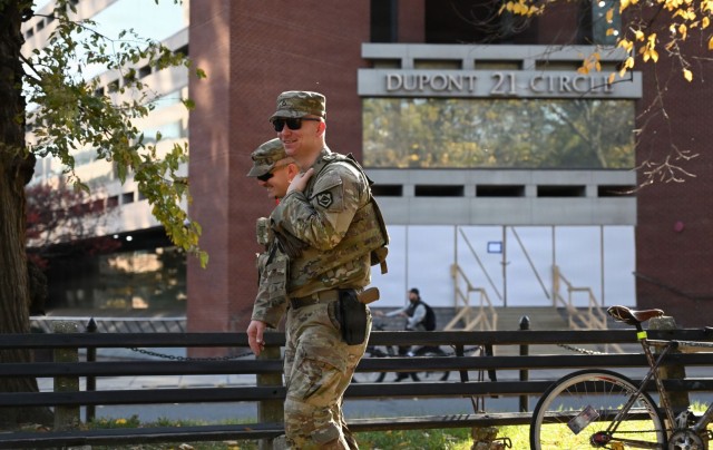 U.S. Army Spc. Ayden Holbert, left, and Pfc. Daniel Tippett, both assigned to the West Virginia National Guard, conduct a presence patrol in the Dupont Circle area, Washington, D.C., Nov. 3, 2025. About 2,400 National Guard members support the...