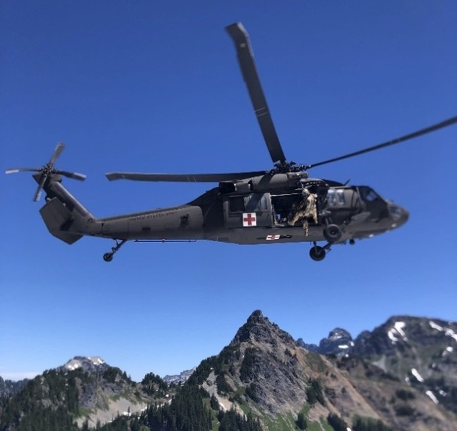 A UH-60L Black Hawk assigned to the U.S. Army Air Ambulance Detachment-Yakima, 2-158 Assault Helicopter Battalion, 16th Combat Aviation Brigade, conduct a rescue mission in the vicinity of Dragon Tail Peak, Wash. to pick up a patient with a broken...