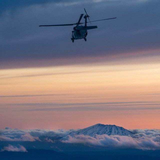 A UH-60L Black Hawk assigned to the U.S. Army Air Ambulance Detachment-Yakima, 2-158 Assault Helicopter Battalion, 16th Combat Aviation Brigade, conduct a rescue mission near the summit of Mount Adams, Wash. during a mission to rescue a...