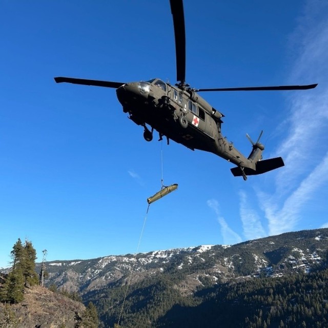 A UH-60L Black Hawk assigned to the U.S. Army Air Ambulance Detachment-Yakima, 2-158 Assault Helicopter Battalion, 16th Combat Aviation Brigade, conduct a rescue mission in the vicinity of Norse Peak Wilderness, Wash. to pick up a victim of a ATV...