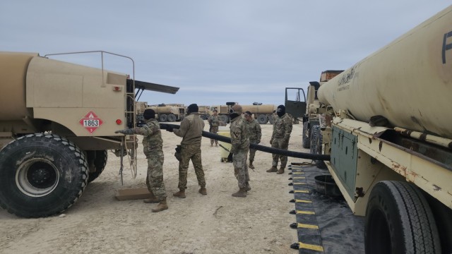 Alpha Distribution Company and 61st Quartermaster Battalion Soldiers execute CLIII bulk fuel transfer during SQT TBX at Fort Hood, Texas, Jan. 27, 2025.