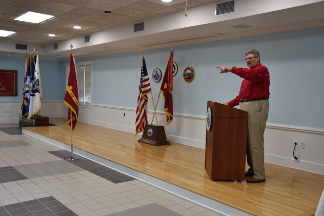 Mr. Steve Kerr, deputy to the commander, 596th Transportation Brigade points to to his colleagues who made the Military Ocean Terminal Sunny Point 70th Anniversary Celebration a reality. Kerr will be retiring before the summer of 2026 after...
